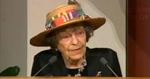 Doris "Granny D" Haddock speaking at a lectern