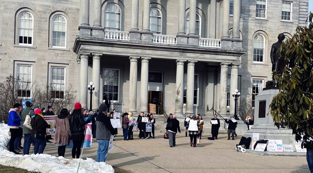 Protesters in front of the NH State House